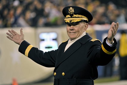 Army Gen. Martin E. Dempsey, chairman of the Joint Chiefs of Staff, leads cadets in a cheer from the field during the Army-Navy football game at Lincoln Financial Field in Philadelphia, Dec. 8, 2012. Navy won 17-13. 