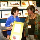Photo: Senator Collins with Mr. and Mrs. Erickson of Round Pond.  Brenda Erickson is owner of Recipe Paintings