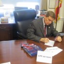 Photo: Signings cards for the annual Red Cross "Holiday Mail for Heroes" program at the U.S. Capitol
