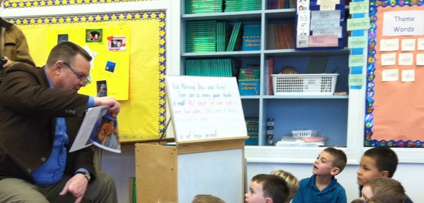 Photo: Reading Piggie Pie to Ms. Gray's First Grade Class in Hamilton