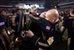 Army Command Sgt. Maj. Todd Burnett, right, command sergeant major of the U.S. Military Academy Corps of Cadets, hugs Army Black Knights quaterback Trent Steelman, left, after a tough game against Navy at Lincoln Financial Field in Philadelphia, Dec. 8, 2012. Navy beat Army 17-13. U.S. Army Photo by Staff Sgt. Teddy Wade