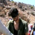 In this image taken from undated video posted to YouTube, American freelance journalist Austin Tice, who had been reporting for American news organizations in Syria until his disappearance in August 2012, prays in Arabic and English while blindfolded in the presence of gunmen. The Associated Press could not independently confirm the origin or the content of the clip, but the Tice family released a statement to several media outlets confirming it was their son in the video. Although the video footage shows a group of captors dressed and behaving like Islamic extremists, the clip lacks the customary form of jihadist videos. Previous reports have indicated that Tice is in Syrian government custody. (AP Photo)