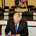 Congressman Sessions signing Holiday cards for the troops