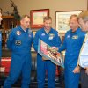 Congressman Mike McIntyre speaks with members of the space shuttle crew for mission STS-132