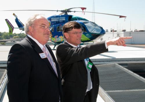 Billy stands with Dr. Charles Roberts on the roof of the Children's Mercy Hospital in Kansas City. 