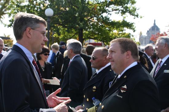 Speaking with local firefighters at the dedication of the new Minnesota Firefighters Memorial