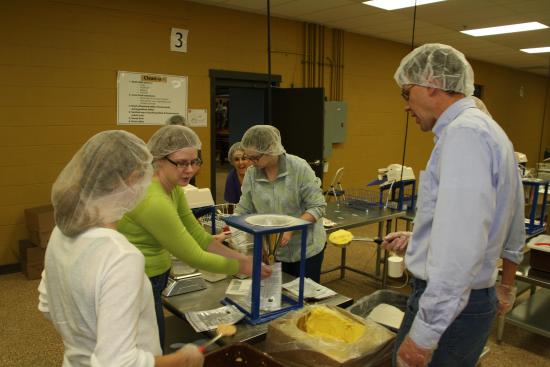 Paulsen and staff make packages during "Feed My Starving Children" event in Coon Rapids