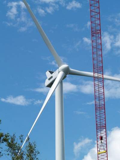 The first of 21 industrial wind turbines is erected in July on Lowell Mountain by Green Mountain Power. During construction in December of 2011, six protesters were cited for blocking construction vehicles. Tuesday they were each sentenced to 25 hours of community service.