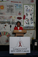 Congresswoman Barbara Lee with the AIDS Memorial Quilt