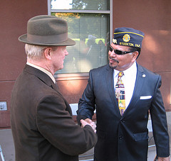 Rep. McNerney speaks with Mr. Richard Campos, veteran of the Marine Corps and California National Guard, at the dedication ceremony of the San Joaquin Delta College Veterans Resource Center.