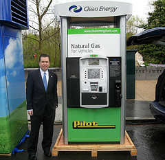 Congressman Boren poses next to a natural gas fueling pump.