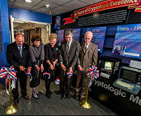 Senior executives from NSA and the National Cryptologic Museum Foundation cut the ribbon for the museum's newest exhibit.