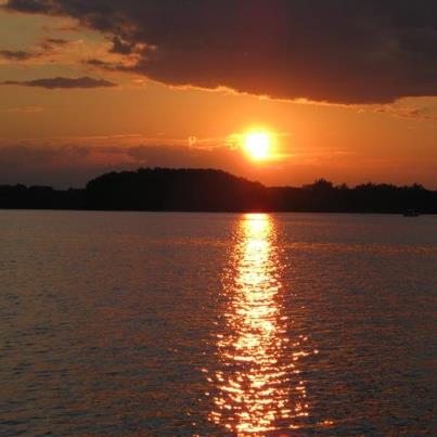 Photo: Thank you and congrats to Brit Adams of Seneca who submitted this beautiful picture of a sunset over Lake Keowee, which has been chosen as my new cover photo!