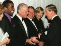 Britain's Prince Charles shares a light moment wit