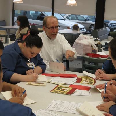 Photo: Over the weekend, Dave teamed up with employees at the Hy-Vee North in Ottumwa and folks from the community to write holiday cards to our troops serving overseas.  At the event, over 200 cards were written and will be distributed by Red Cross’ Holiday Mail for Heroes program.