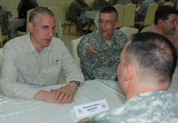 Congressman Tim Murphy talks to Spc. Ken Lewandowski, 1-9th Field Artillery and Mt. Pleasant, PA native, and Staff Sgt. Kurt Chebatoris, 316th Sustainment Command (Expeditionary) support operations noncommissioned officer and Upper St. Clair, PA native. 