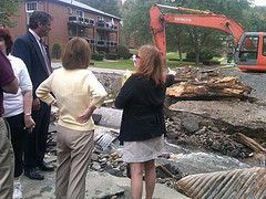 Rep Hayworth views a collapsed section of roadway in South Blooming Grove