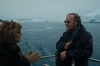 Dr. Richard Alley briefs Senator Barbara Boxer while observing icebergs in Disko Bay, near Ilullisat, Greenland.