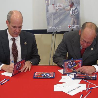 Photo: I joined my colleague from Washington State, Rep. Rick Larsen, to sign holiday cards for our troops and their families today as part of the Red Cross "Holiday Mail for Heroes" program. Learn more here: http://www.redcross.org/support/get-involved/holiday-mail-for-heroes