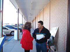 Rep. Ben Ray Lujan meets with a constituent at a DTV event
