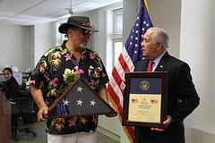 Congressman Reyes meets with OPERATION H.O.P.E., presenting Angel Gomez with a flag!