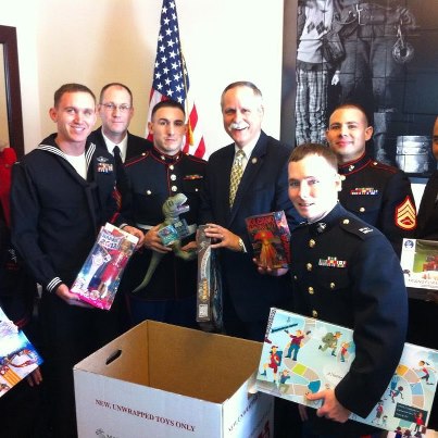 Photo: Members of the Marine Corps and the Marine Corps Reserves collect toys from staff members at Rep. McKinley's office in Washington, D.C.  Rep. McKinley conducts the toy drive every year for needy children.