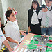 Congresswoman Johnson looks at 1st place project from 3rd graders from Edinburg, TX
