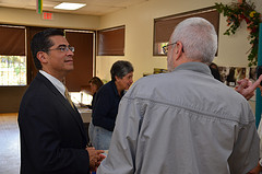 Rep. Becerra Speaks with a Constituent at Senior Citizen Town Hall