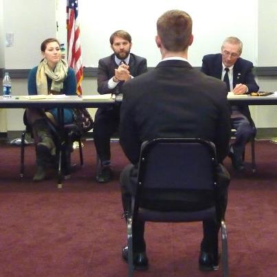 Photo: Interviewing candidates for U.S. military service academy nominations.