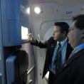 Photo: Flight attendant demos LED mood lighting on 787 Dreamliner