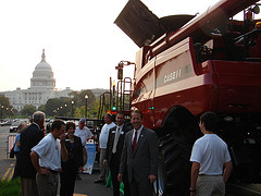 Congressman Smith with constituents next to a combine near the Capitol