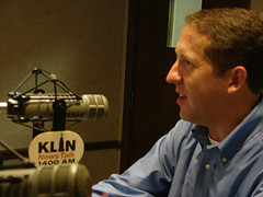Congressman Smith giving radio interview 