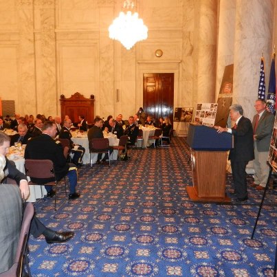 Photo: Senator Akaka delivers his final speech to the Army Caucus breakfast