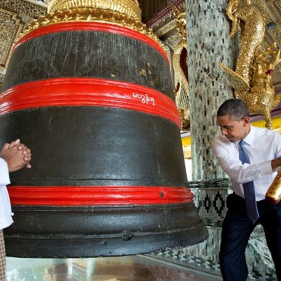 Photo: Behind-the-Scenes Photo: President Obama rings a large bell during a tour of the Shwedagon Pagoda in Rangoon, Burma, Nov. 19, 2012: http://wh.gov/Nsfg