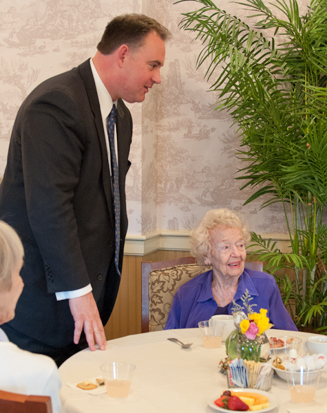 Representative Guinta talks to a resident of the Emeritus at Spruce Wood Senior Living Center in Durham, NH
