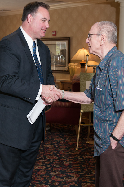 Representative Guinta talks to a resident of the Emeritus at Spruce Wood Senior Living Center in Durham, NH