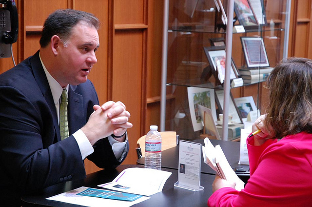 Congressman Guinta talking with a Granite State woman at his Empower, Educate, Engage Women's Conference