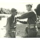 Photo: Charles R. Johnson being awarded the Distinguished Service Cross while serving in Italy. His paperwork was lost and the awards forgotten for more than 60 years.