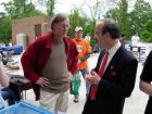 David Hurd, (I) Director of the Office of Recycling Outreach Education, discusses some of the finer points of recycling with Congressman Eliot Engel who met Mr. Hurd at the Riverdale Y Environmental Action Fair.