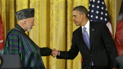 Date: 01/11/2013 Description: President Barack Obama shakes hands with Afghan President Hamid Karzai at the conclusion of their joint news conference in the East Room of the White House in Washington, Jan. 11, 2013. © AP Image