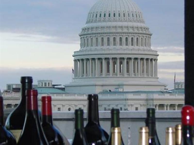 Wine bottles set against the backdrop of the U.S. Capitol.