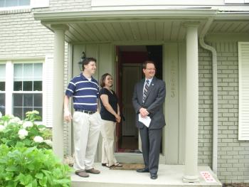 Representative Peters with new Oakland County homeowners, who used the home buyer tax credit in the recovery plan to buy their first home