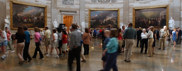 Snapshot of a crowd of people on a guided tour through the Rotunda of the U.S. Capitol