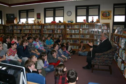 Billy reads to 4th and 5th graders at Pershing Elementary School in Springfield