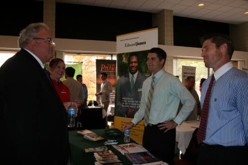 Billy speaks with Jeremy Young and Jason Fronaberger from Edward Jones at the Drury University Job Fair