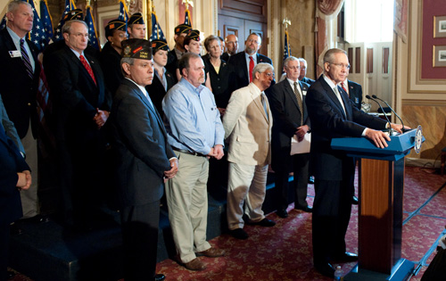 Marine Lance Corporal Matthew A. Snyder's father and members of the VFW, American Legion, and Military Officers Association of America