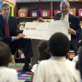 Education Sec. Duncan and Rep. Scott read to students.