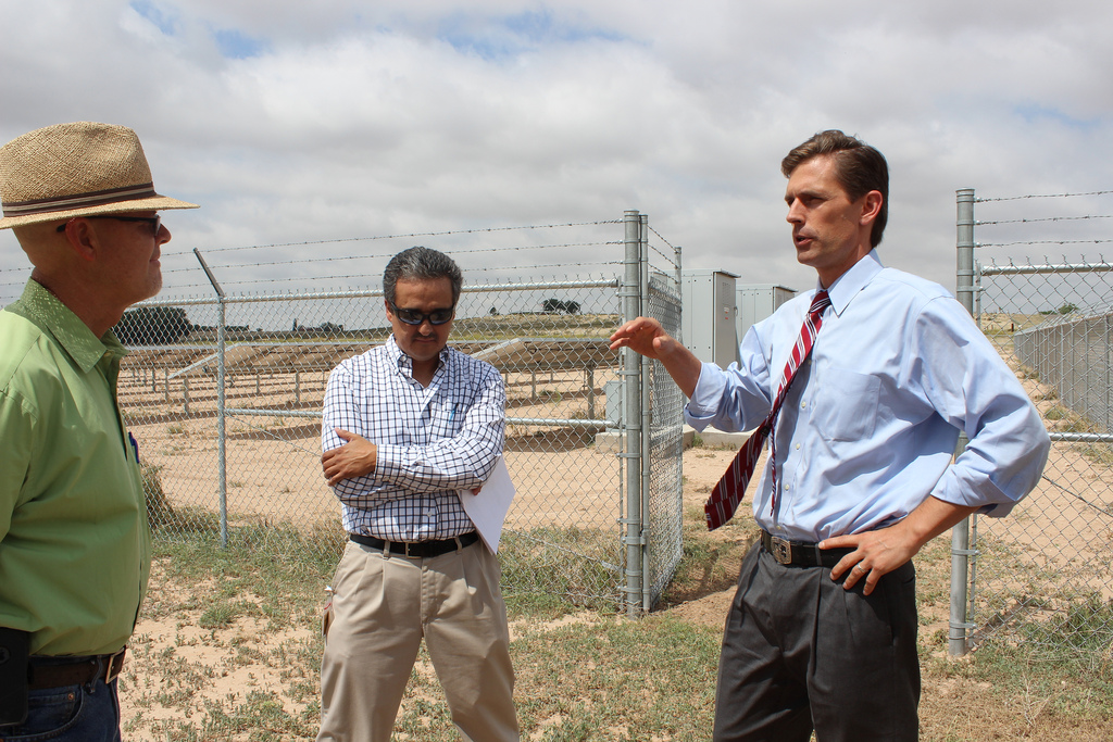 U.S. Senator Martin Heinrich (D-N.M.) talks with Bruce Haley, owner of Haley Farms, and Manger of Engineering Robert Perea about their long term projects. 