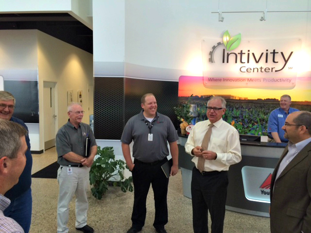 Rep. Walz talks with employees at the new visitors center at the AGCO manufacturing plant in Jackson, MN