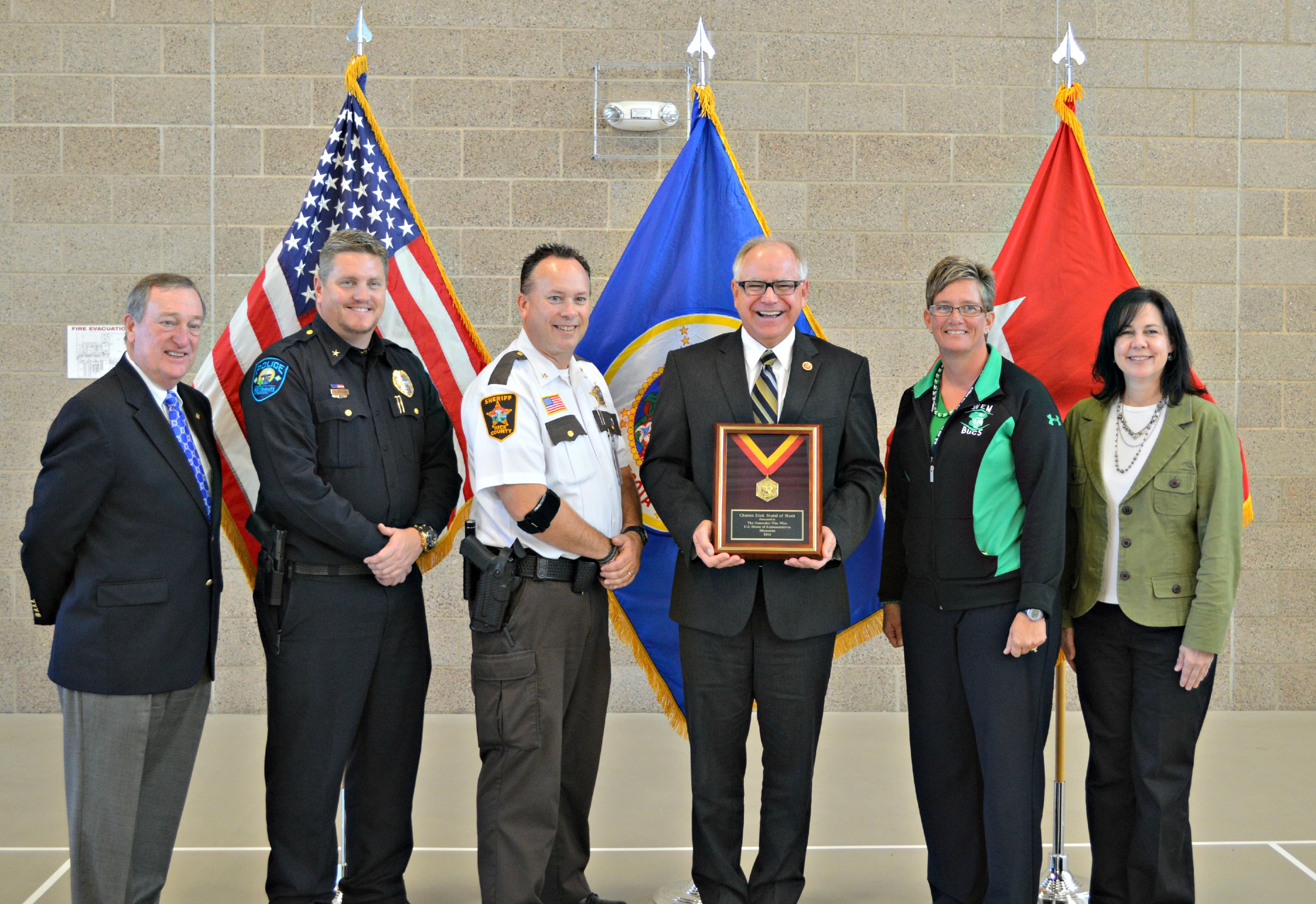 From left: Maj. Gen. (Ret.) Gus Hargett, Faribault Police Chief Andy Bohlen, Rice County Sheriff Troy Dunn, Rep. Walz, and Faribault Beyond the Yellow Ribbon representatives Tracy McBroom and Lynda Schlukebier